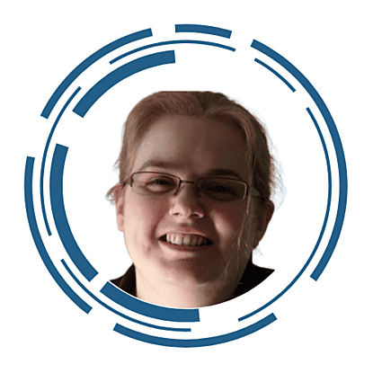 A headshot of Michelle Idiens, the director, she is wearing glasses and smiling